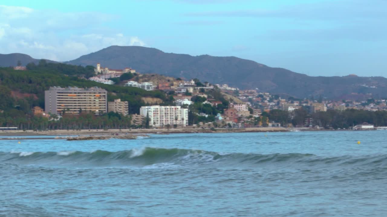 View on the coastline of Malaga, Spain from Malagueta beach - Panning LEFT to RIGHT