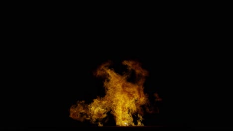 Big-fire-explosion-ground-sparks-from-the-bottom-of-the-screen,-black-background,-transparent-overlay-with-alpha-matte,-​​big-explosion-effect-video