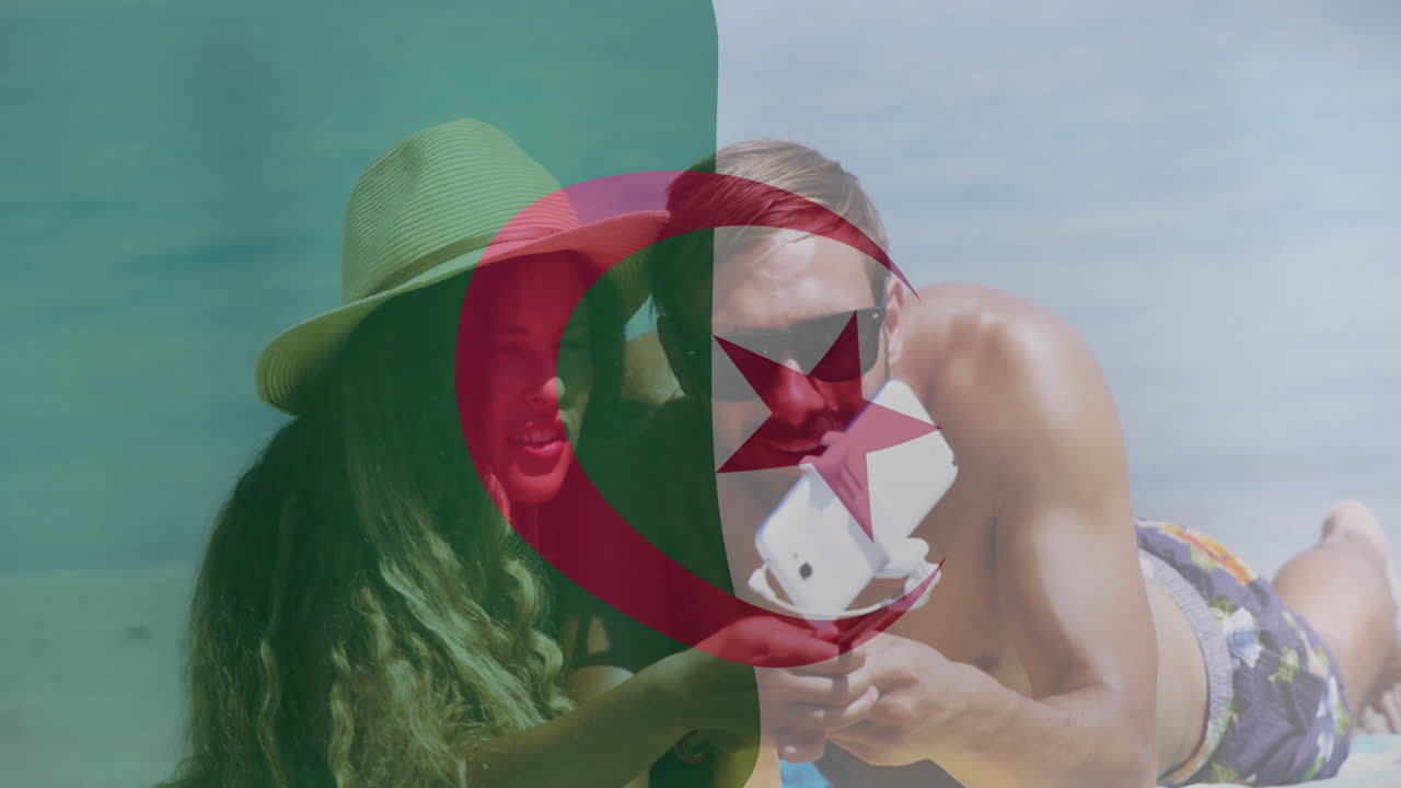 해변에서 셀피를 찍는 커플, 배경에는 알제리 발 애니메이션