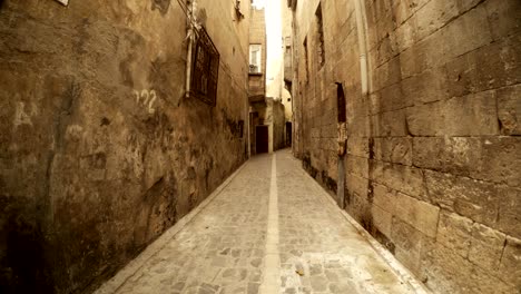narrow ancient stone street far old mosque sanliurfa
