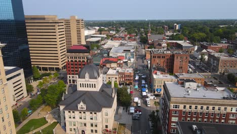 aerial view of downtown city with courthouse and farmers market