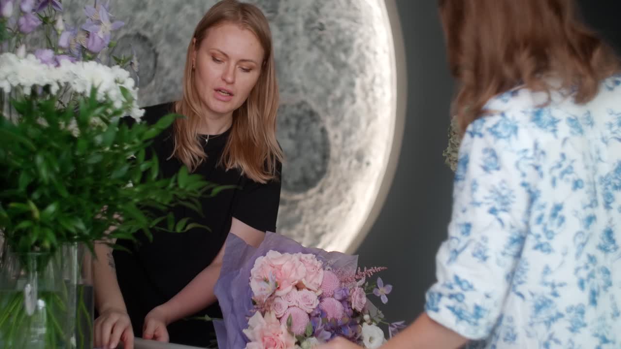 Florist interacting with customer