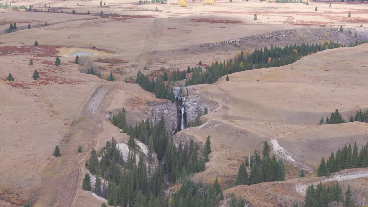 A wide angle view of Bighorn Waterfall in Ya Ha Tinda Ranch Alberta Canada near Banff National Park