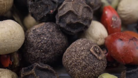 Macro-close-up-Mixed-peppercorns.-Dry-mix-peppercorns-close-up