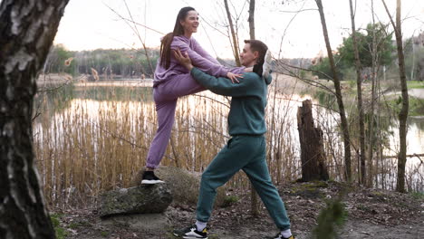 Couple-stretching-outdoors