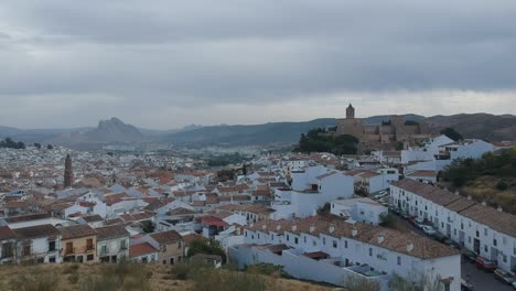 aerial views with drone over the monumental city of southern andalusia in antequera, málaga, views of its castle and monumental area of said world heritage city