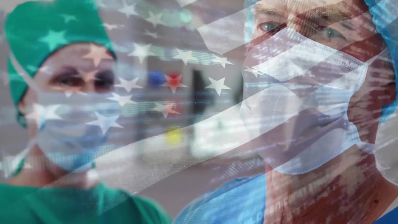 La telecamera si allontana rivelando medici che incrociano gli sguardi mentre una sovrapposizione animata di bandiera mostra l'unità medica.