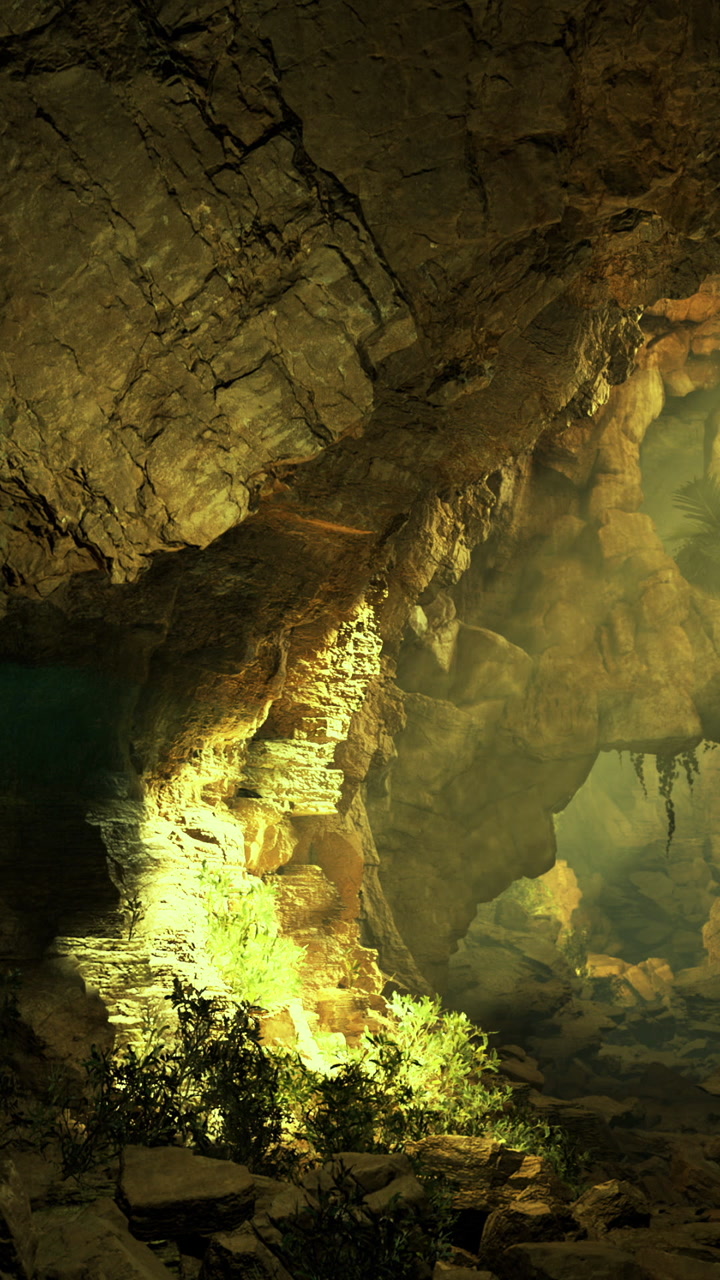 Exploring a cave with light illuminating the rocky walls and greenery