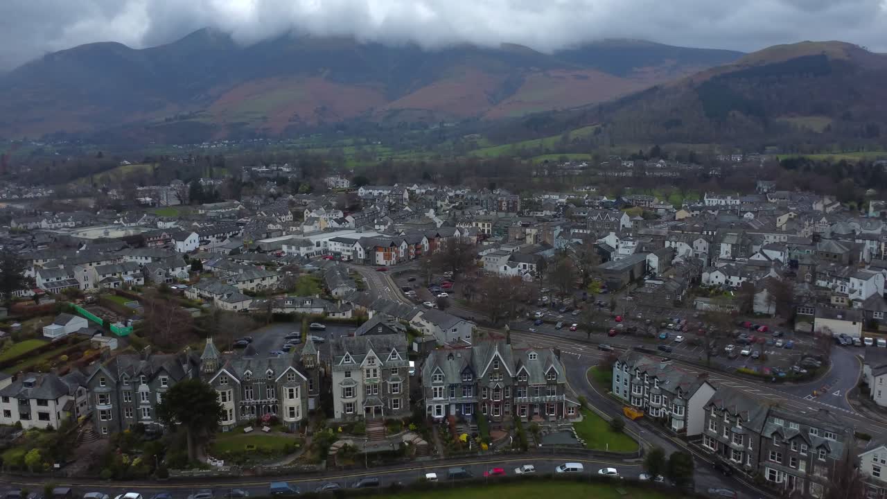 Aerial view of Keswick on a grey, moody day with Skiddaw hiding in the clouds - Lake District, England
