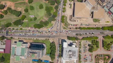 Aerial-time-lapse-of-traffic-at-an-intersection-in-Accra,-Ghana