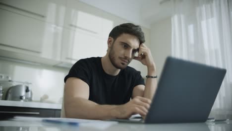 Tired-businessman-have-break-after-working-online-on-computer-at-home
