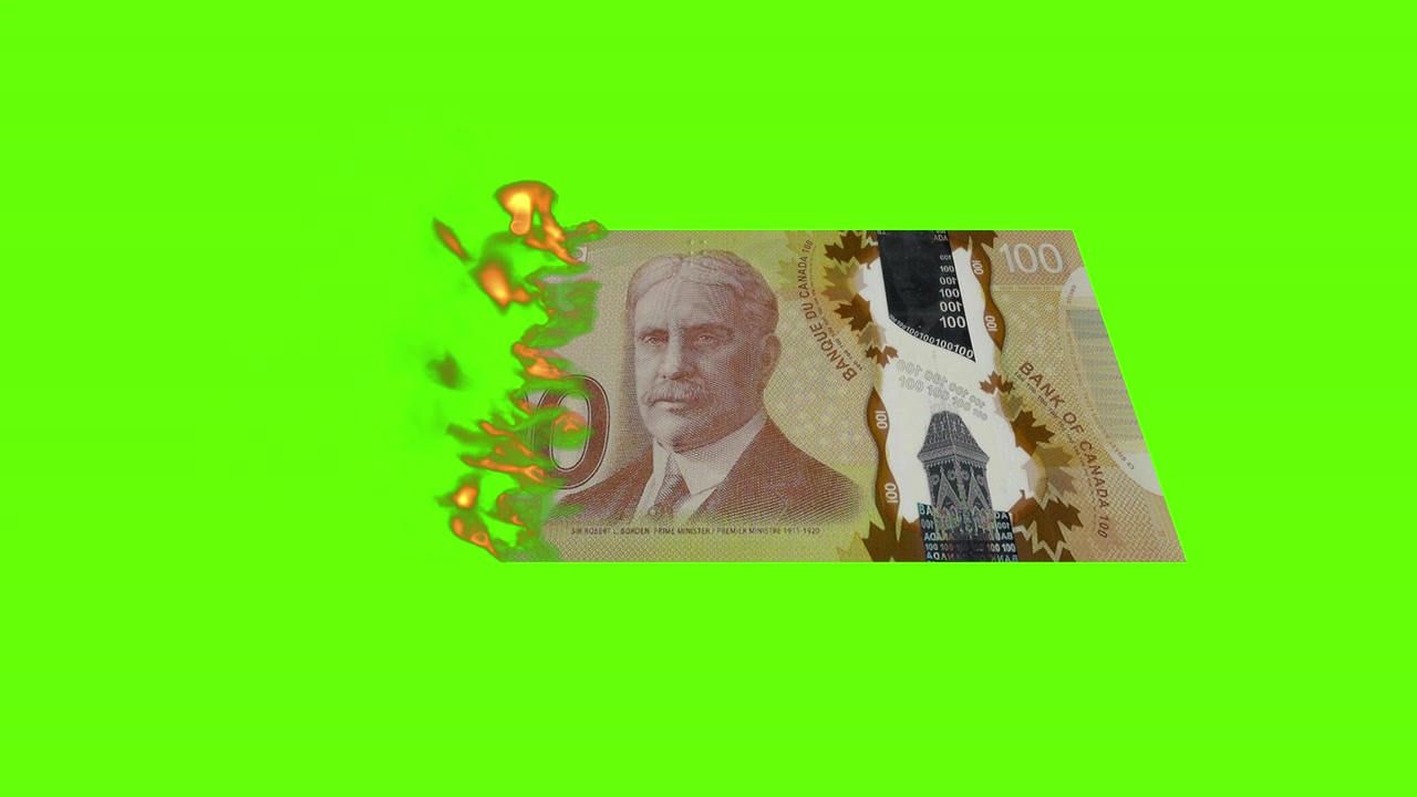 Banconota canadese da 100 dollari in fiamme su schermo verde