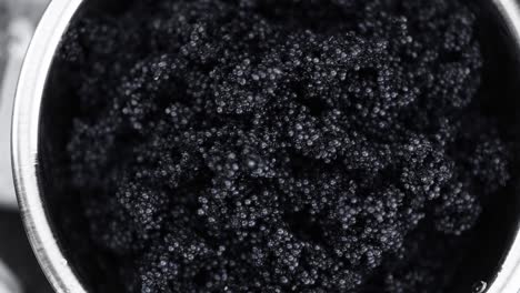 seamless loopable rotating black caviar (close-up)