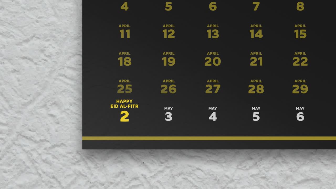 Close-up of a black beautiful wall calendar page with a schedule of Ramadan fasting days 2022 and the camera moves to Eid al-Fitr date marked yellow