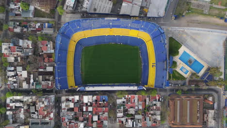 aerial view of a football stadium surrounded by city buildings