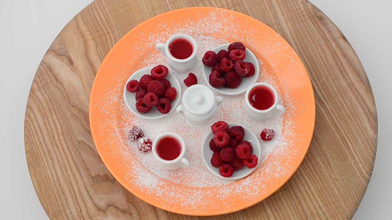 Raspberry and jam, still life. Shooting in the movement