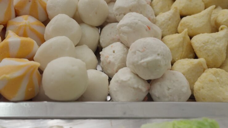 Fish Balls and Various Ingredients Trays For Shabu-Shabu Asian Food, Close Up
