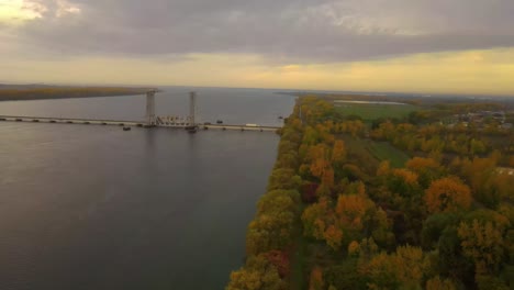 quebec valley with a bridge crossing the river during autumn fall