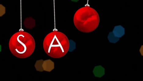 animation of sale text on red baubles and christmas fairy lights flickering over black background