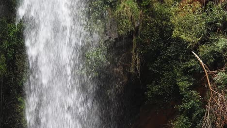 Crocodile-river-waterfall-flowing-and-falling-over-rocks-at-the-walter-sisulu-national-botanical-gardens-in-roodepoort,-South-Africa