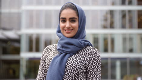 Portrait-Of-British-Muslim-Businesswoman-Outside-Office