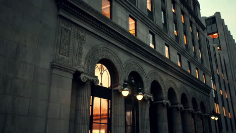 an ornate building with windows lit up at night