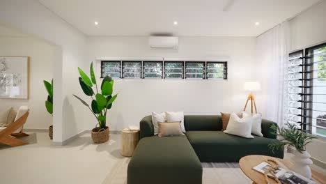 minimalist loungeroom with sleek modern furnishings and natural lighting in a luxury small home