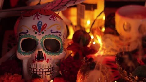 Sugar-skull-foreground-and-incence-smoke,-Day-of-the-Dead-establisher