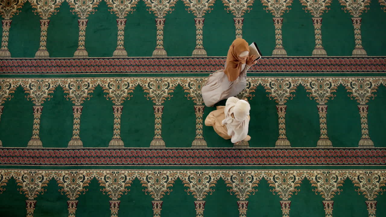 Muslim women reading in a mosque