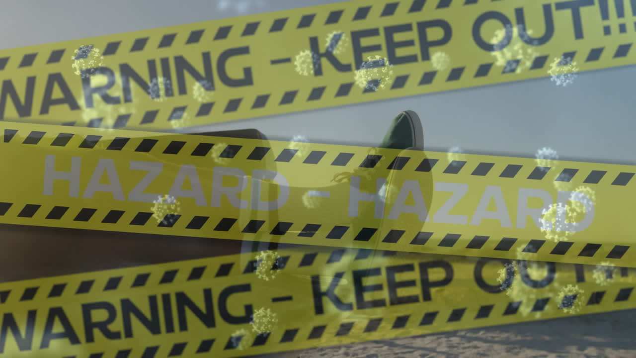 Digital composite video of yellow police tapes with warning keep out hazard text against man