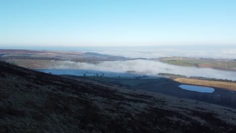 Lancashire-shadowy-rural-countryside-aerial-cloudy-misty-valley-moorland-hillside-landscape-fly-over