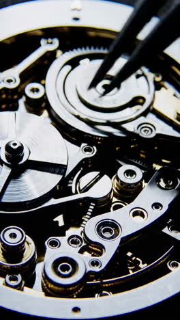 close-up of a watch movement under repair