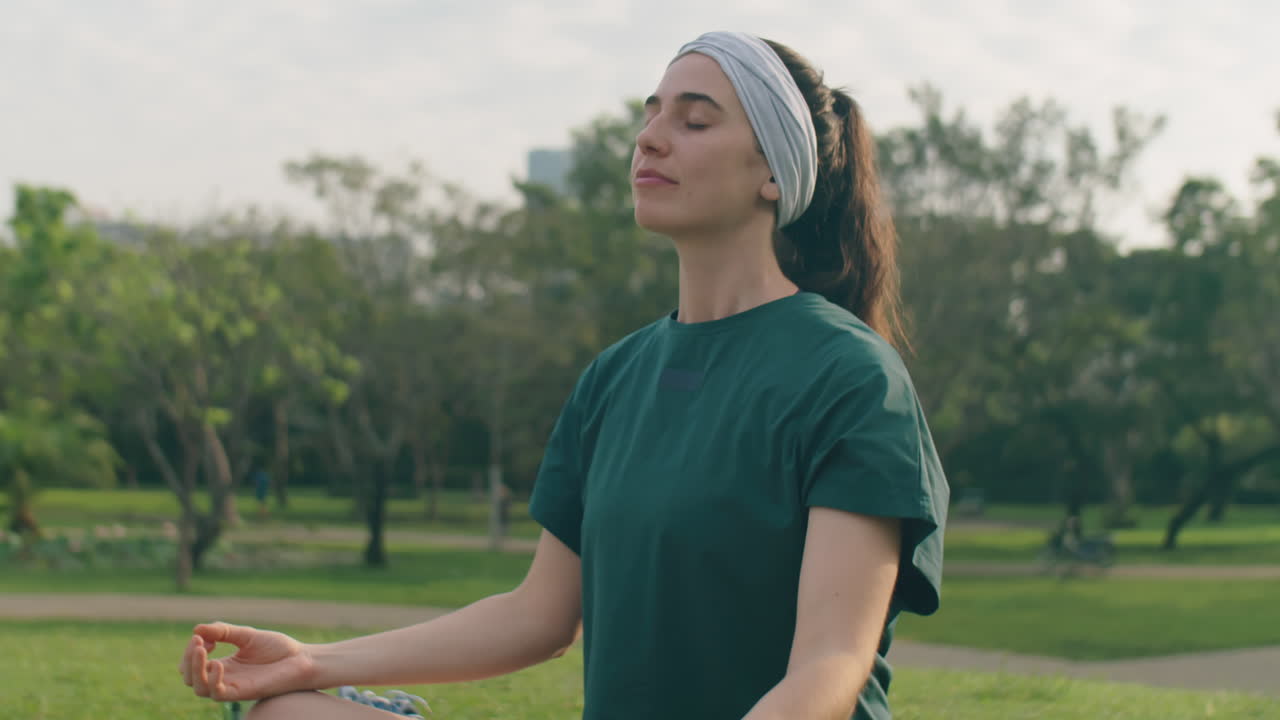 Woman Doing Meditation in Park