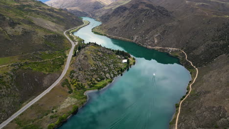 aerial circle view over a beautiful water stream near city of cromwell