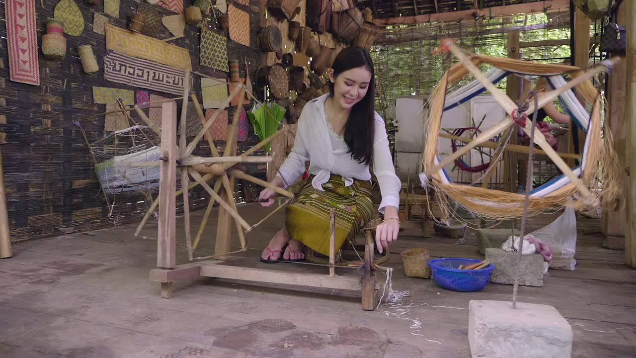 Woman Weaving Traditional Thai Textiles