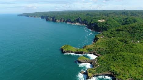 Aerial-panorama-of-scenic-cliffs-on-Kesirat-coast,-Java,-Indonesia