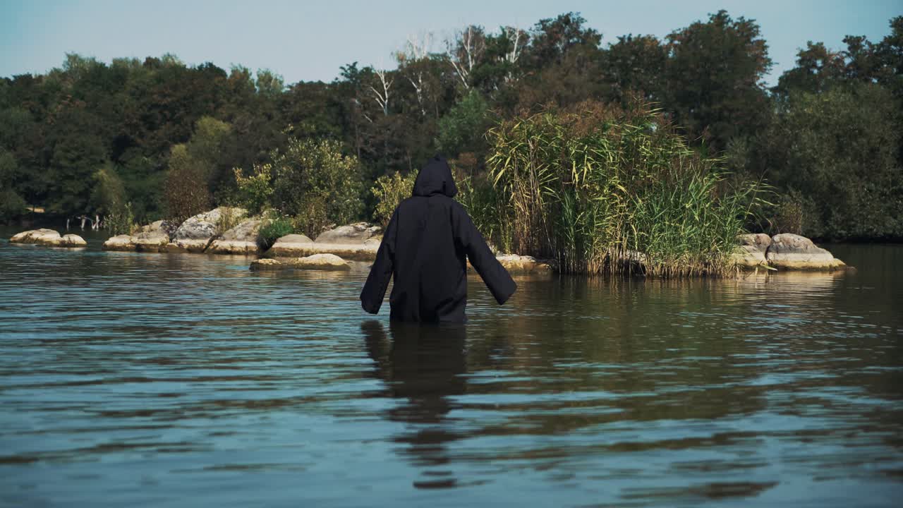Ghost woman in the water outdoor. Divination by the water
