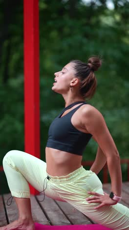 woman doing yoga outdoors