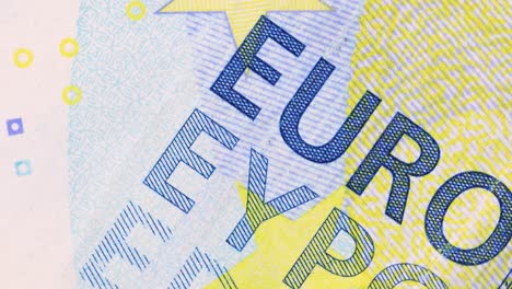 Zwanzig-Euro-Schein-Oberflächendetail-Gedruckter-Buchstaben,-Rotierend,-Makroaufnahme