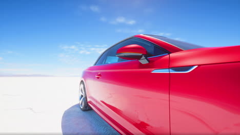 red audi convertible on salt flats