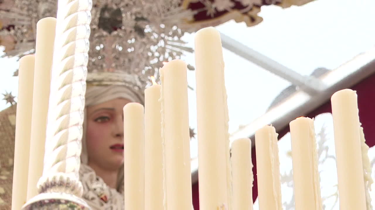 Religious Procession with Candles and Statue