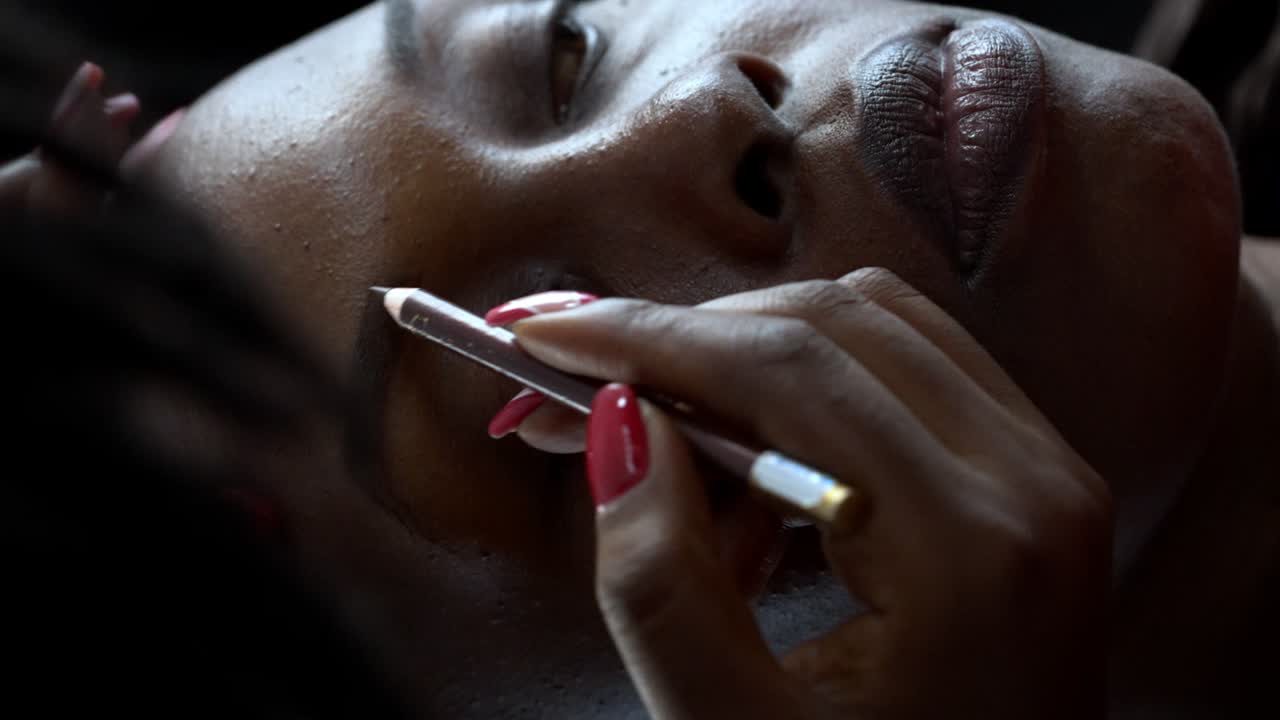 The Actress Getting Makeup Done Before a Video Shoot - Vertical Shot