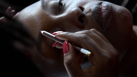 The-Actress-Getting-Makeup-Done-Before-a-Video-Shoot---Vertical-Shot