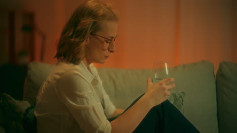 sad woman hugs pillow suffering from loss