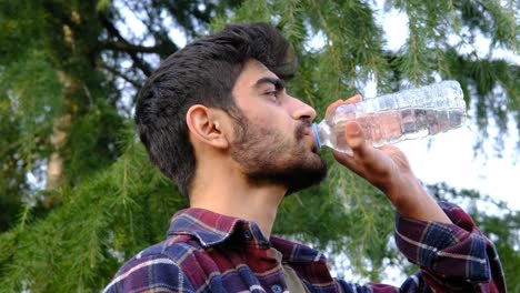young man drink wather