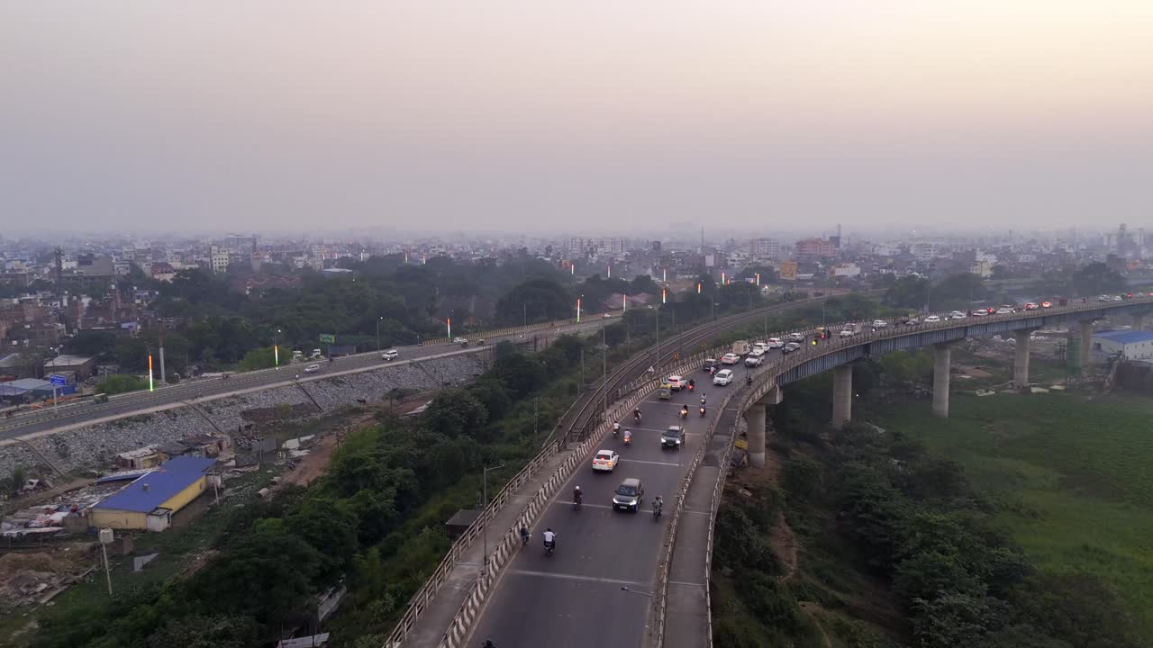 Digha Sonpur Bridge road, JP Ganga Path expressway, Patna city under hazy sky in winter, Bihar, Drone shot