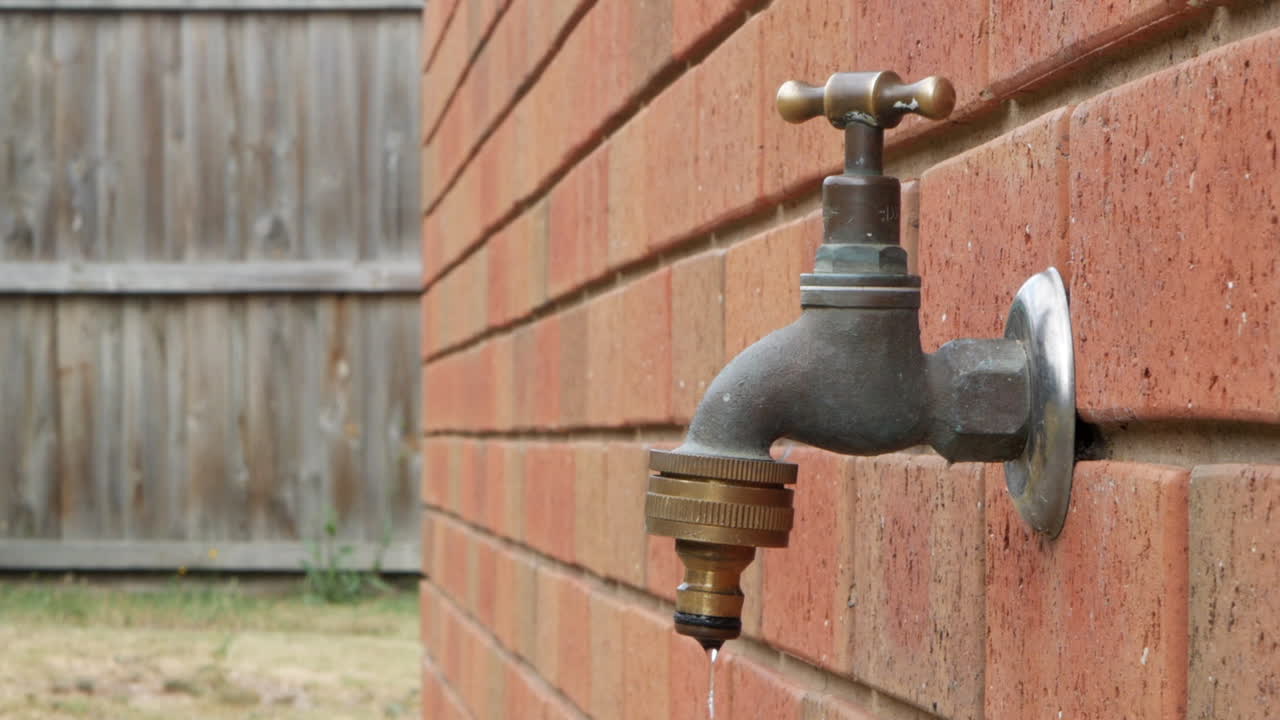 Leaking faucet turned off by a white male