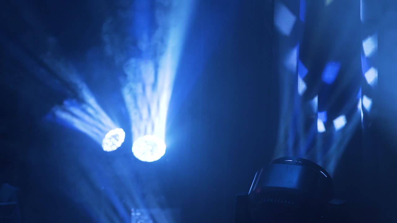 Robotic beam concert lights, equipment B-roll footage