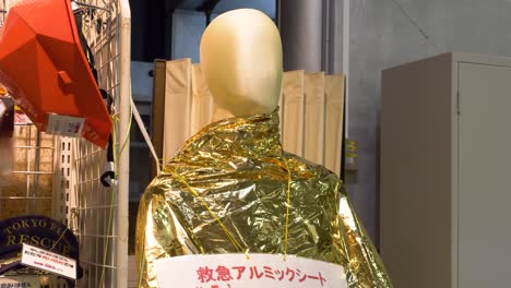 Close-up shot of foil blankets on a model within the Honjo Safety learning Center
