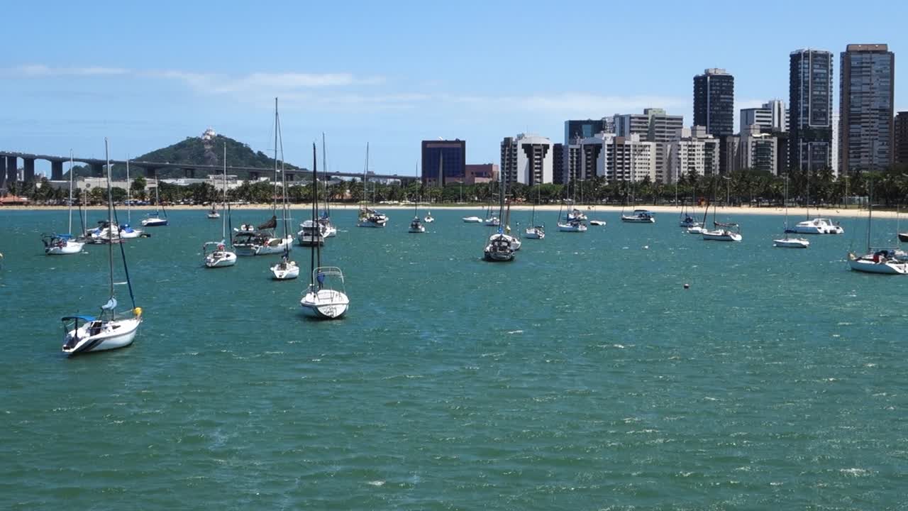 Vitoria bay with sail boats and buildings on summer daytime